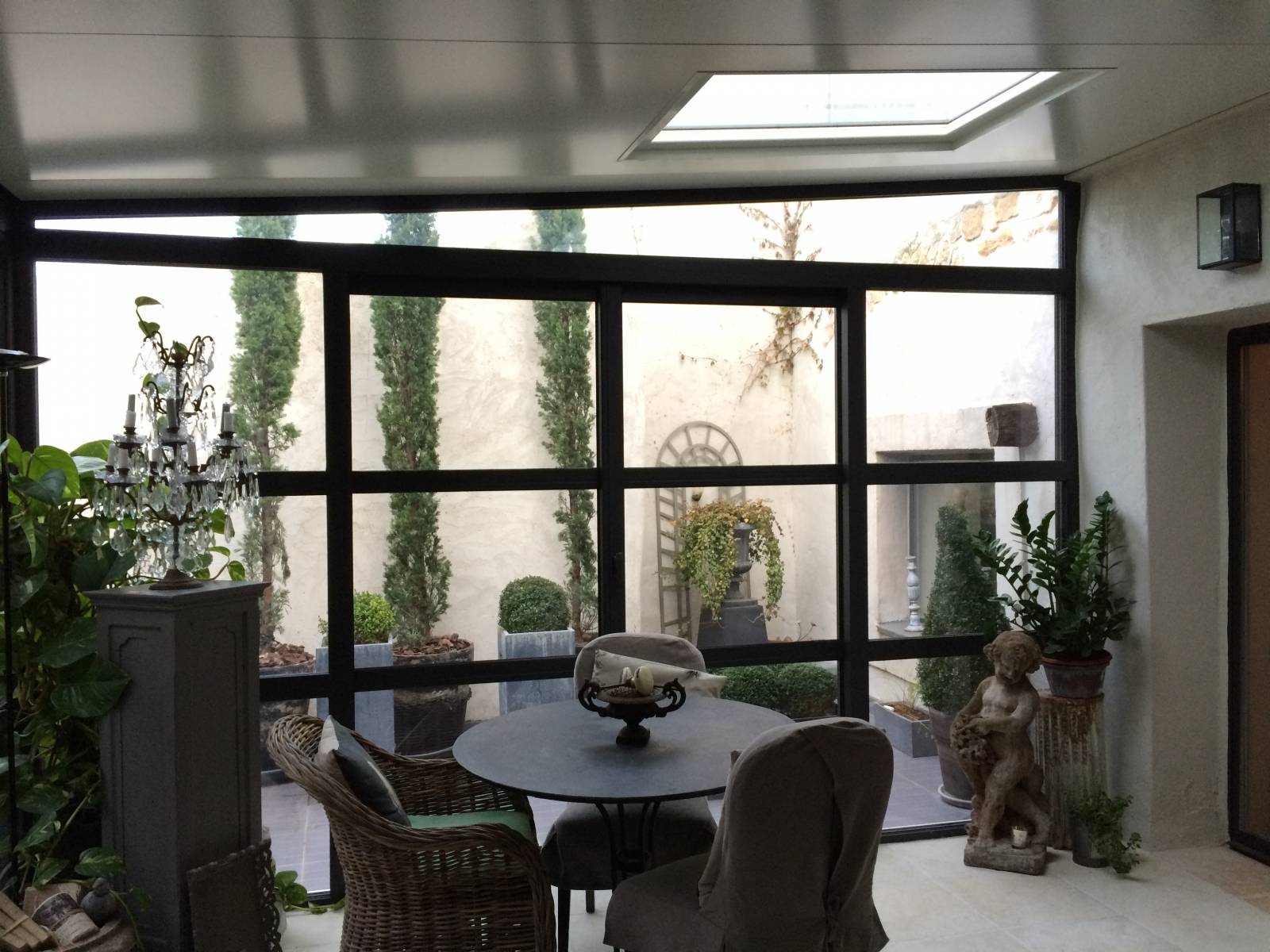 Pose d'une véranda jardin d'hiver dans le Gard