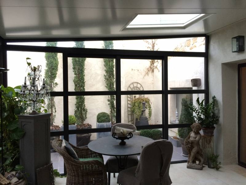 Pose d'une véranda jardin d'hiver dans le Gard