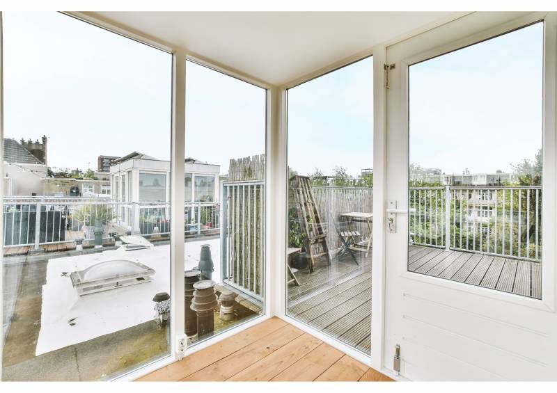 Conception de véranda sur un toit terrasse à Nimes