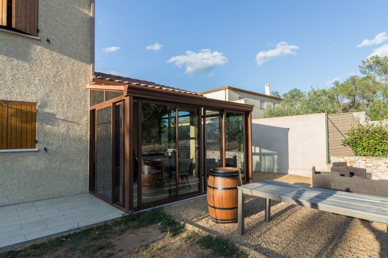 Poseur de véranda en aluminium dans le 30